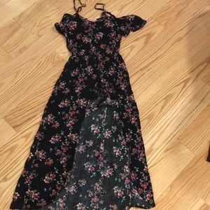 a romper with a “cape”